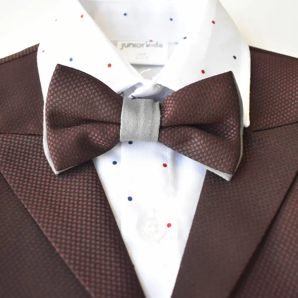 Dapper David Formal Vest Set featuring a burgundy vest, white polka dot shirt, and a gray bow tie.