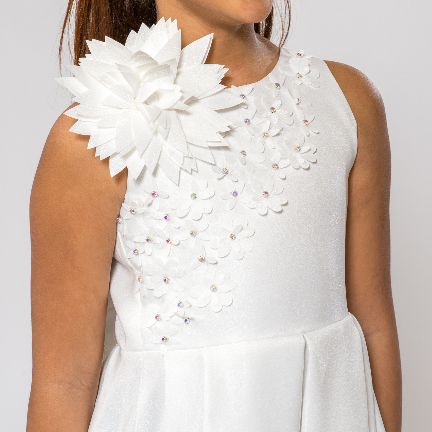 A-line dress by Prestige Perla featuring a floral embellishment and sparkling details on the bodice.