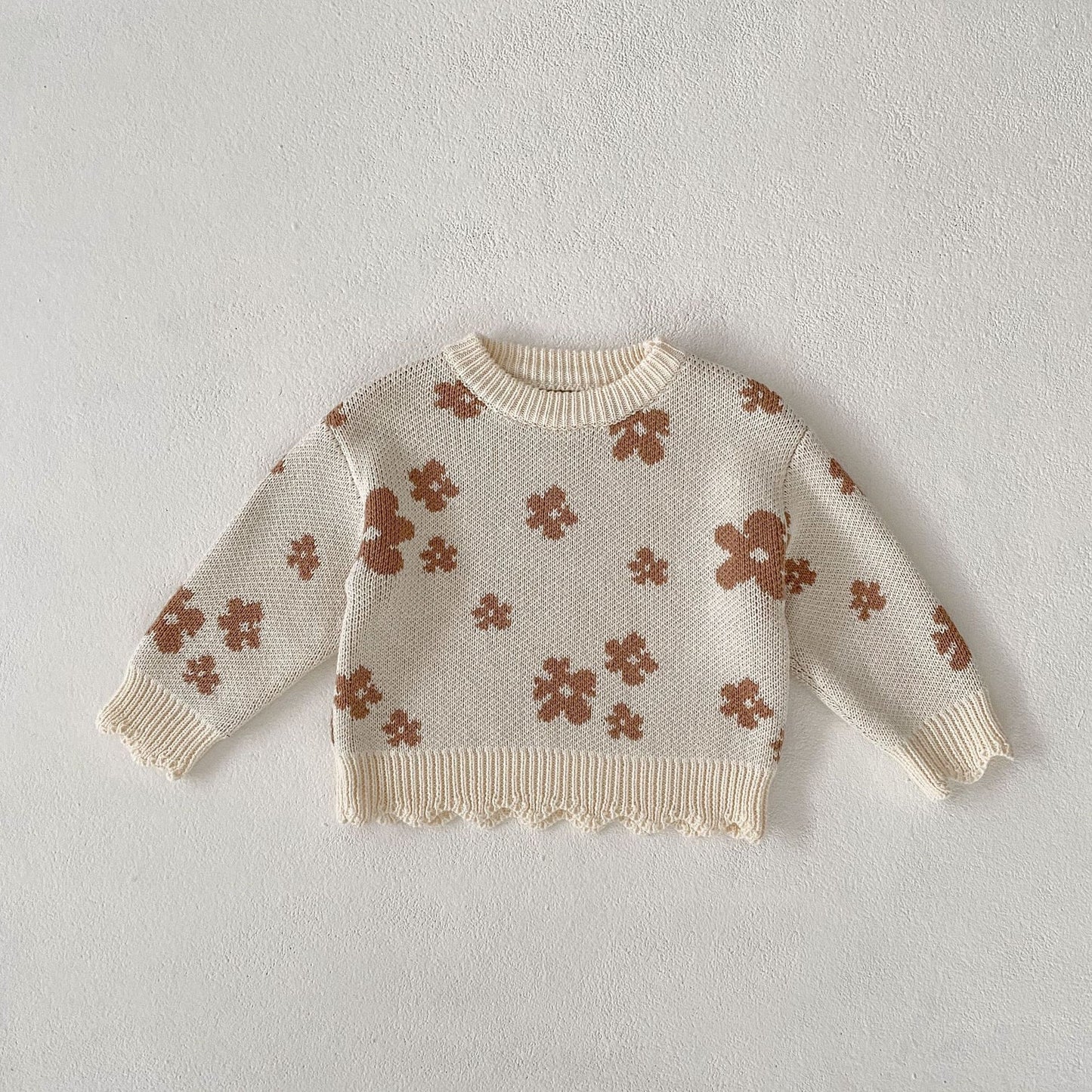 Girl's Knitted Shirt Versatile Top featuring a cream base with brown floral patterns and a scalloped hem.