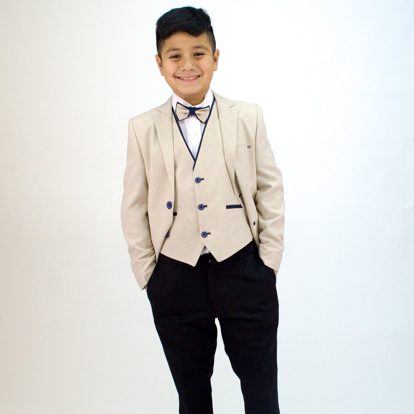 Captain Stylish Formal Boys Suit featuring a light beige blazer with a vest and black trousers, complemented by a bow tie.