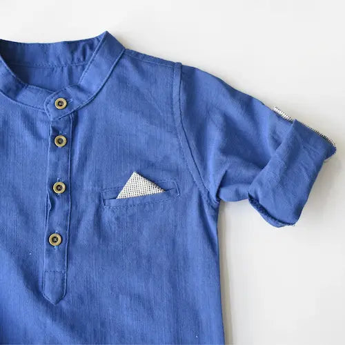 Breezy Ben Boys Casual Set featuring a blue short-sleeve shirt with a button placket and a pocket detail.