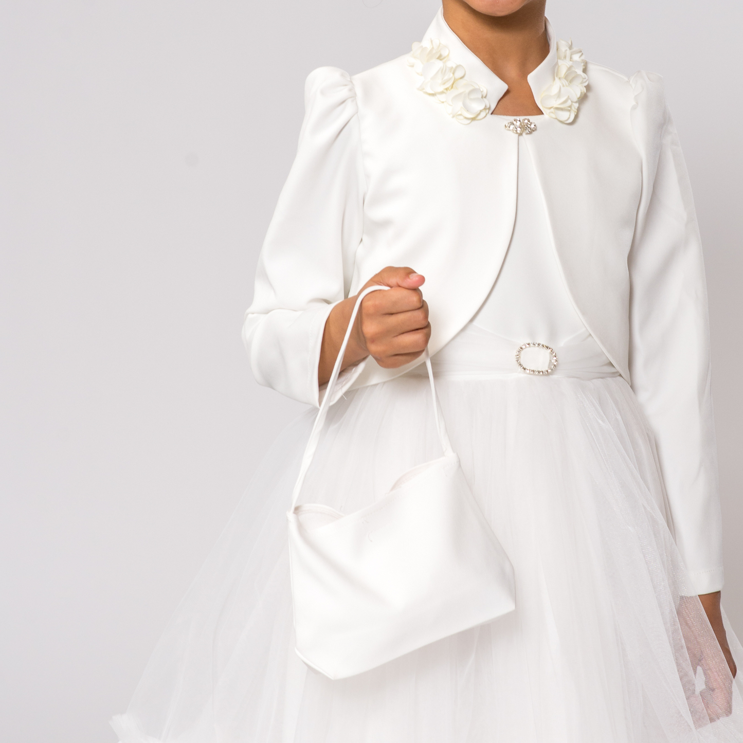 Claudia's Fancy Girl Dress features a white dress with a tulle skirt and a matching jacket adorned with floral details.