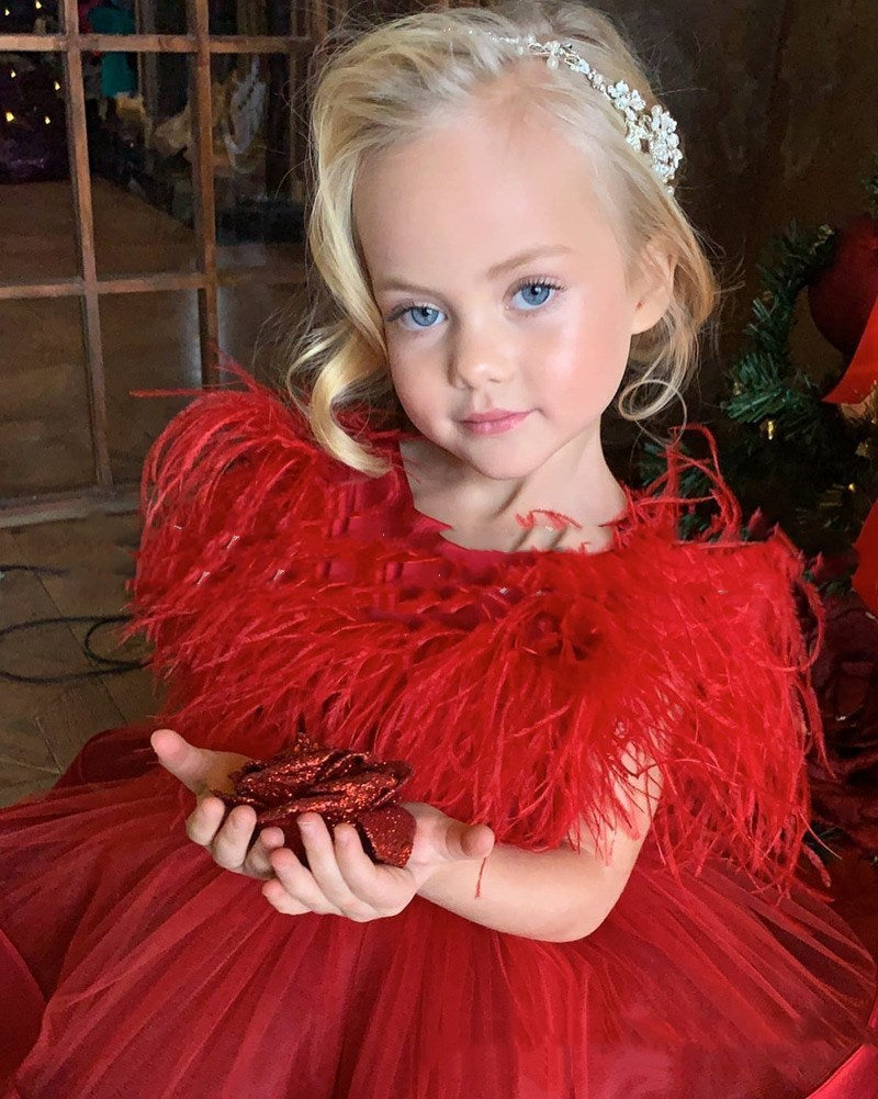 Girl's red feather dress