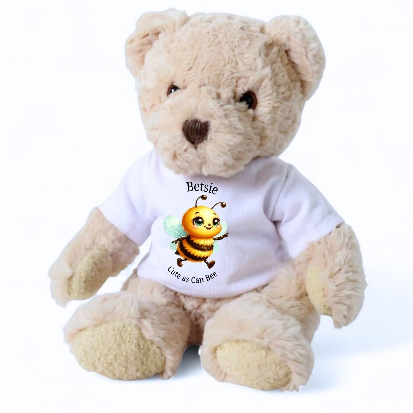 Personalised luxury teddy bear wearing a white t-shirt with a cute bee graphic and the name "Betsie."