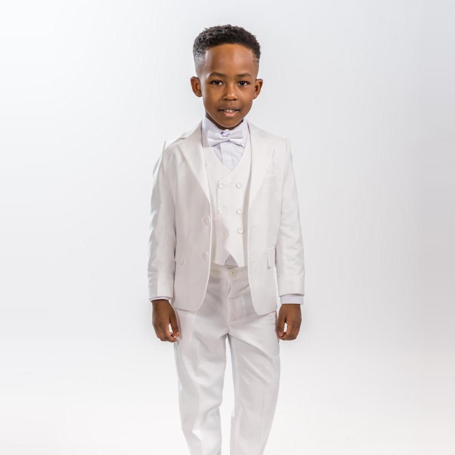 Classic Groom Boys Suits featuring a white three-piece suit with a bow tie, perfect for formal occasions.