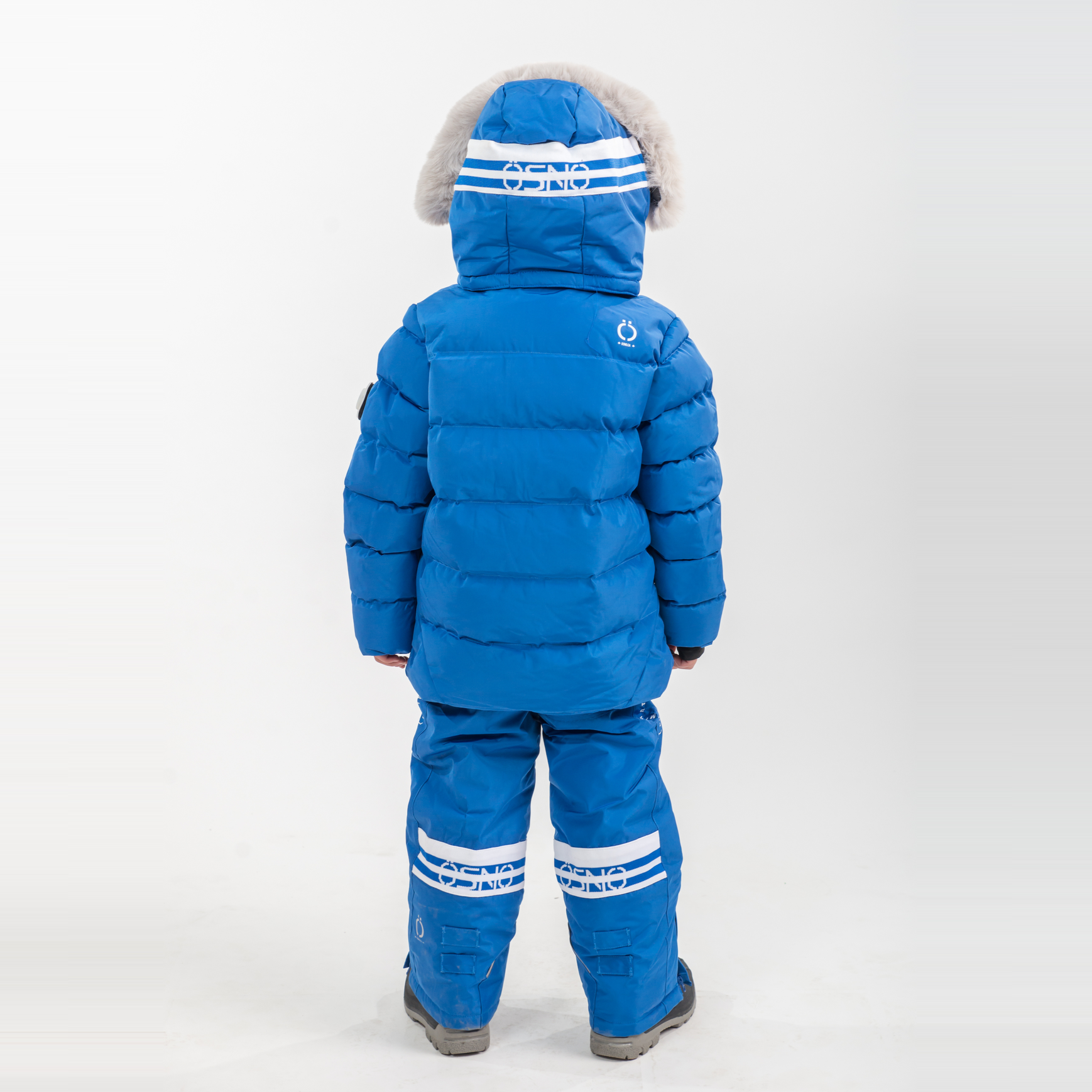 Liam's Luxury Snowsuit features a blue puffy jacket with a fur-lined hood and matching snowpants, designed for warmth and sty