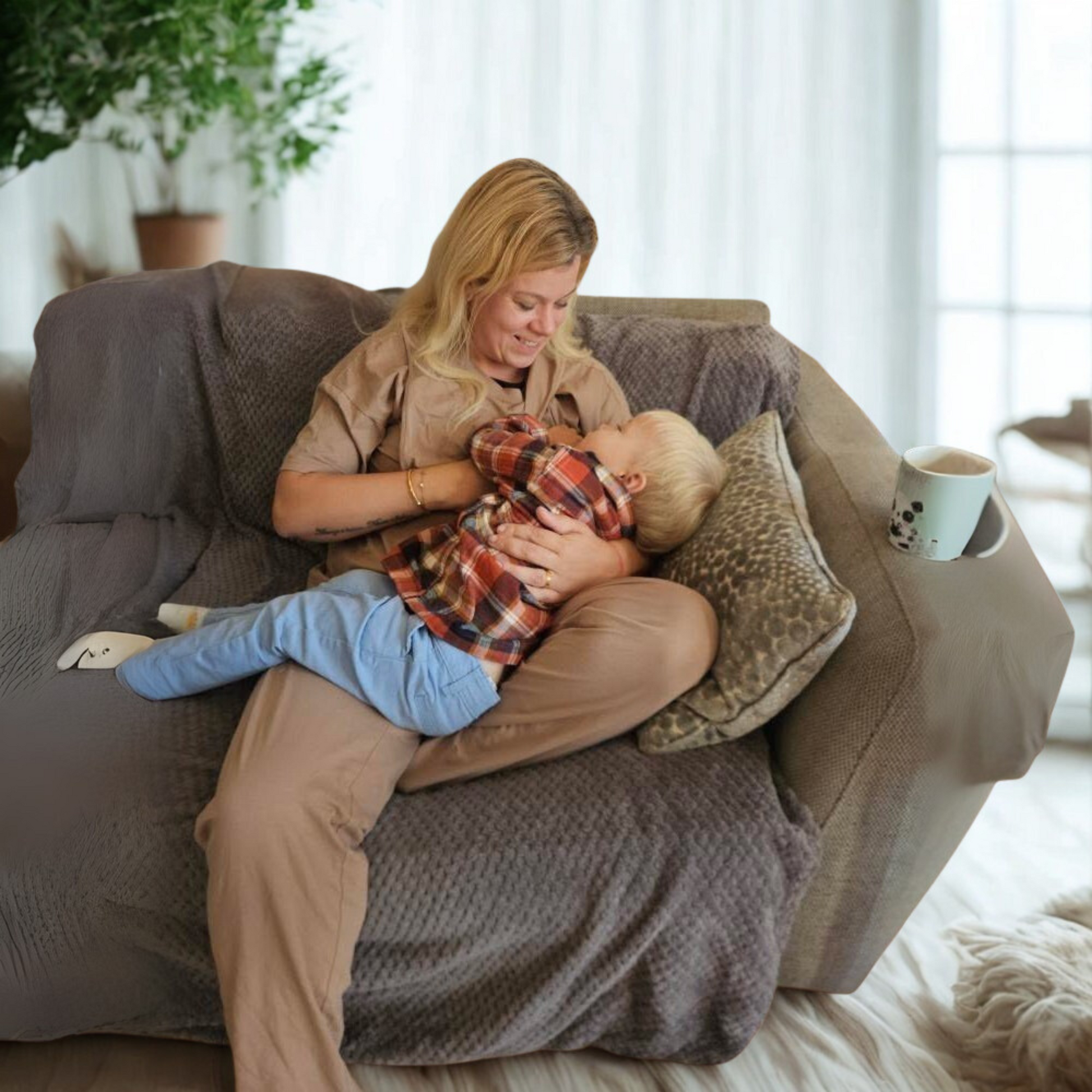 Mocha Luxurious Cotton Breastfeeding Loungewear Short Sleeve, featuring a mother comfortably nursing her child on a couch.