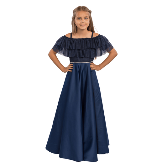 Emily's Gown Girls Formal Dress features a navy blue off-the-shoulder design with ruffled detailing and a long, flowing skirt