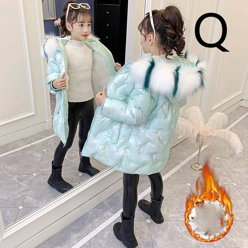 Children's mid-length padded down jacket in mint green with a faux fur hood, worn by a girl in front of a mirror.